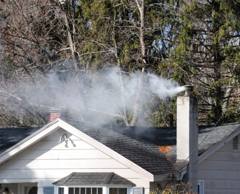 How to Recognize & Resolve Chimney Fire Signs