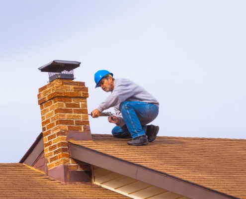 Chimney inspection on roof