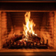 Fireplace burning firewood, fire flames on wood logs, bricks background
